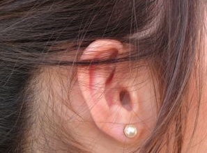 Woman Listening Woman's ear